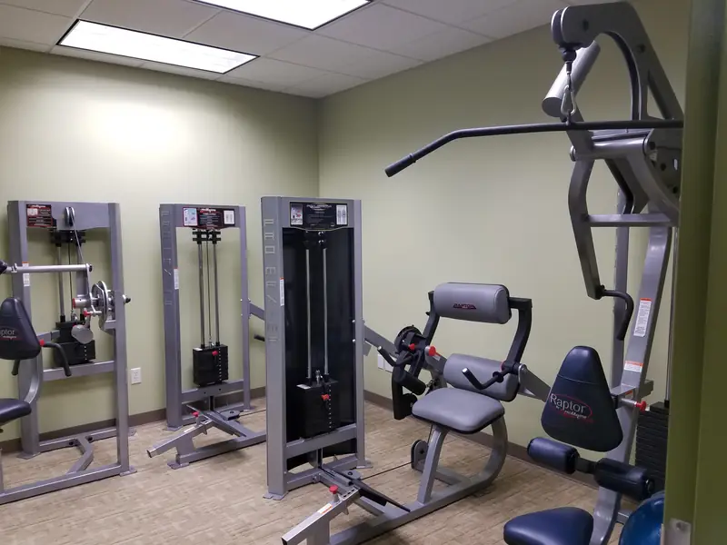 Exercise equipment in the Savannah office's therapeutic exercise room
